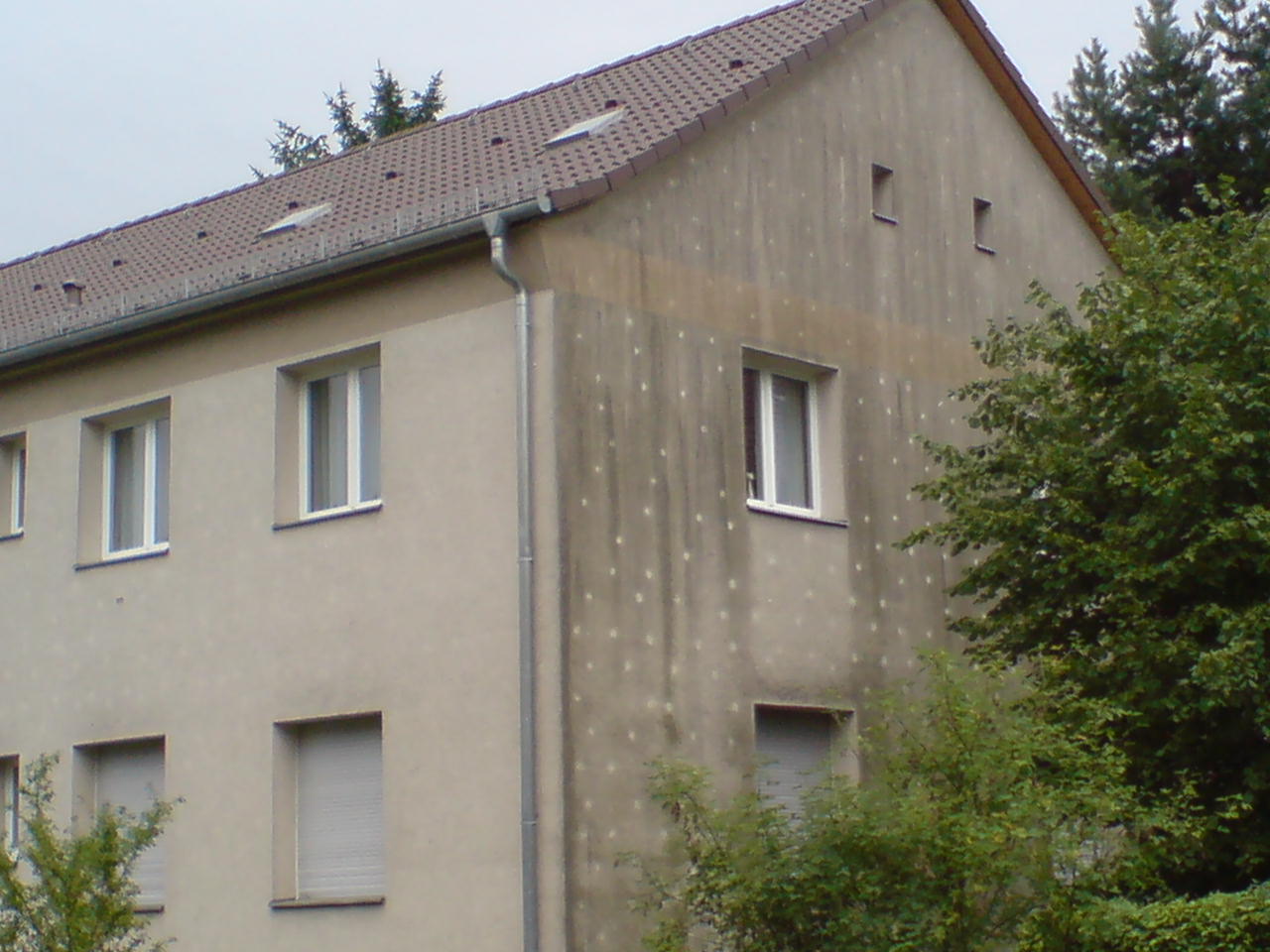 Bestandsgebäude mit gedämmter Fassade